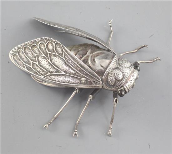 A Japanese silver articulated model of a cicada, by Muneyoshi, Meiji period, length 5.2cm
